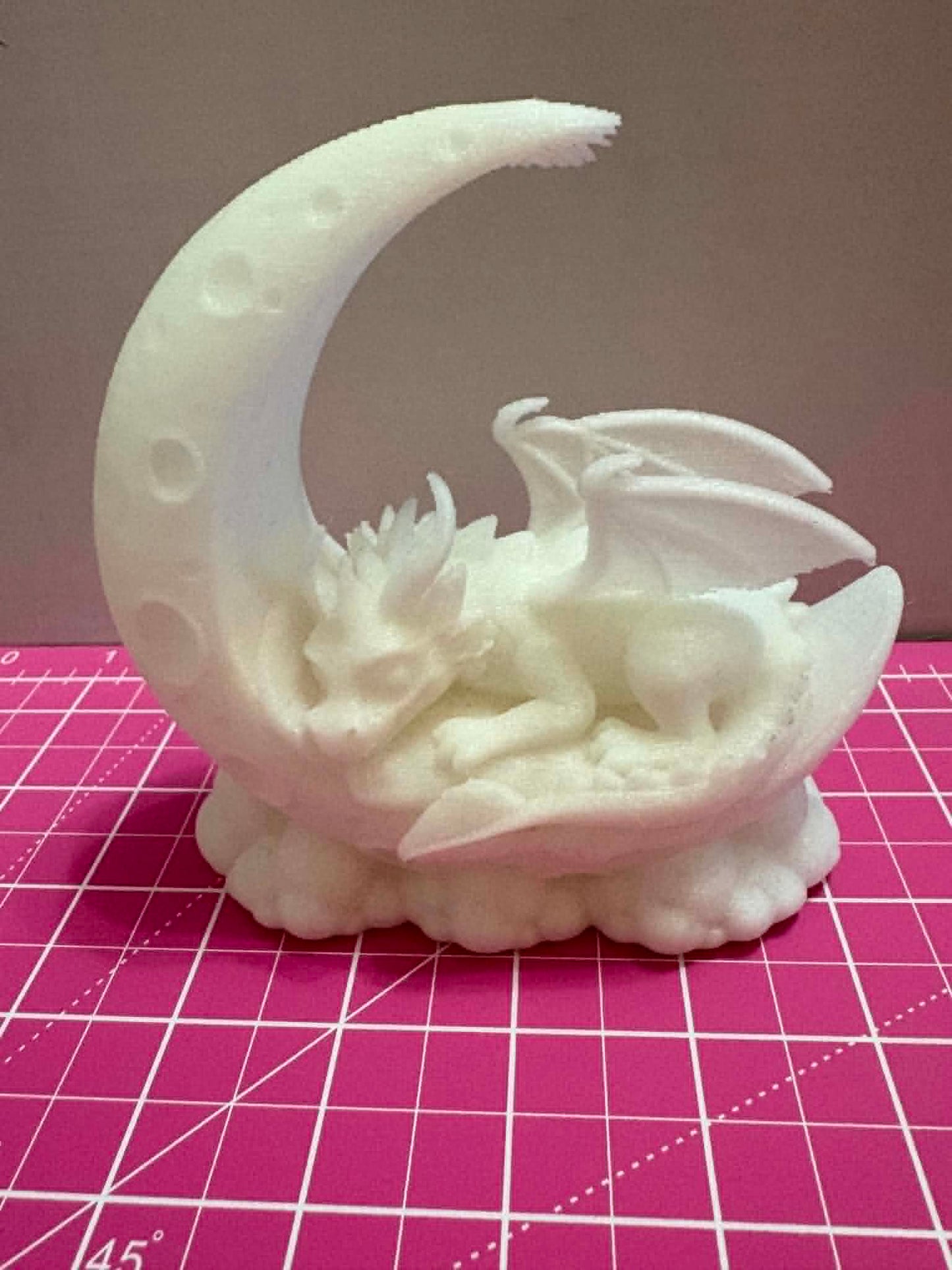 dragon on a moon