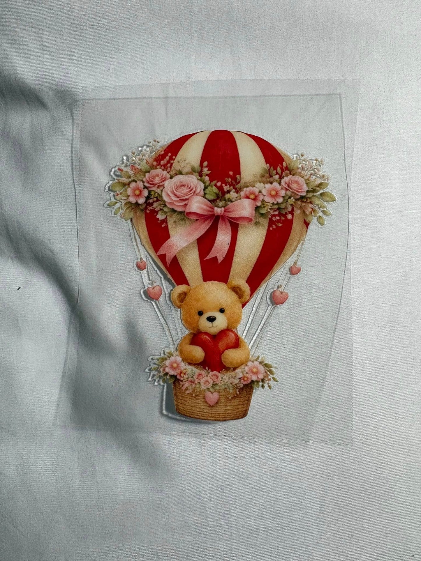 bear in a hot air balloon