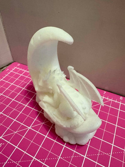 dragon on a moon